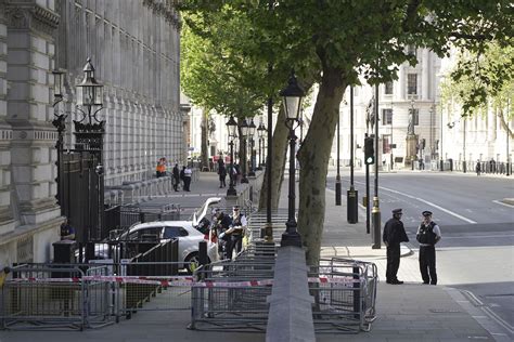 Man arrested after car collides with gates of Downing Street, where UK prime minister lives